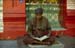 Man reading at Scwedagon 868929