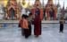 Monk receiving gifts at Schwedagon 868627