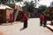 Women in street among bungalows Chowkidhani 005038