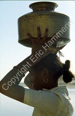 Woman with jar on head Dwarka 861431