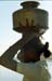 Woman with jar on head Dwarka 861431