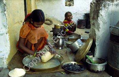 Girl making bread Pushkar 864621