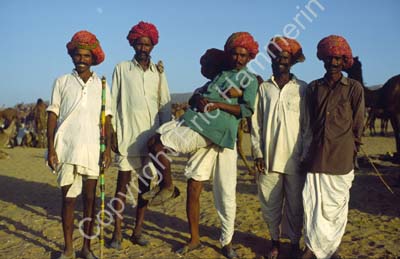Men at Pushkar camel fair 864733