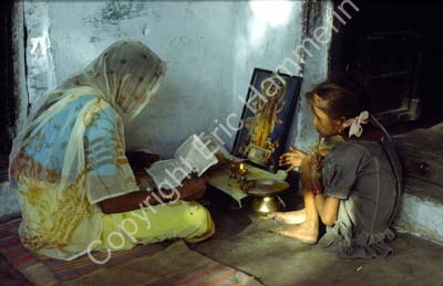 Mother and daughter pryer time Pushkar 864721