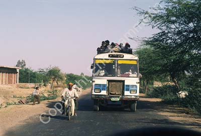 Bus overtaking scooter in Rajasthan 004842