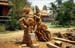 Wooden statue being carved 8724813