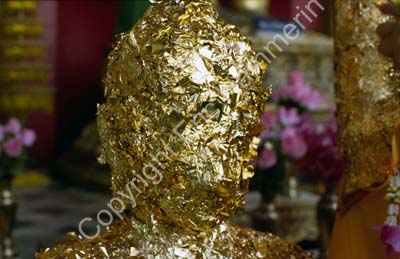 Nakhon Pathom gold leaf on staue 8725605