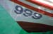 Boat stern with numbers 999 8721033