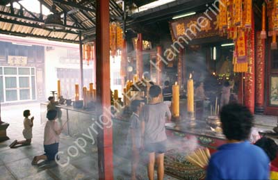 Temple with incense smoking 8724333