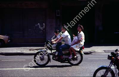 Family four on motor bike 850703