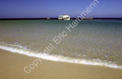 Boat off the shore 8720938