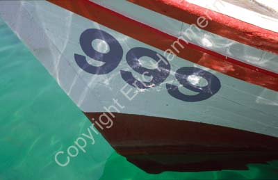 Boat stern with numbers 999 8721033